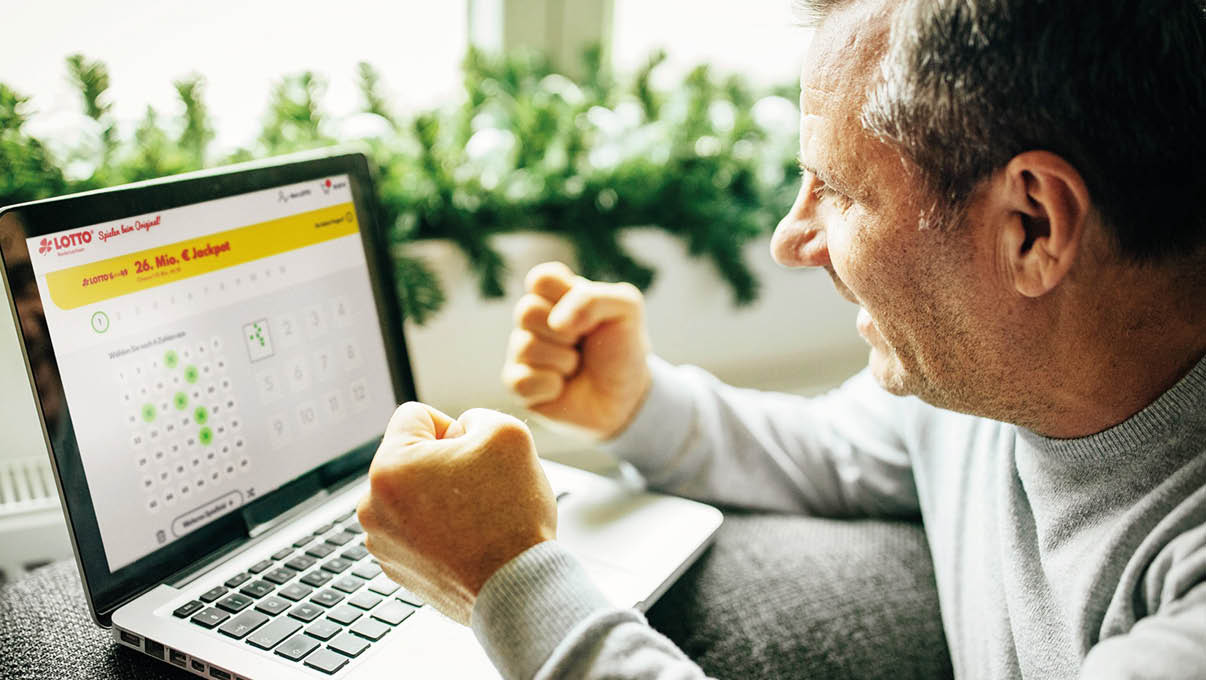 Mature man using mobile app for live betting and online gambling and watching a sports match